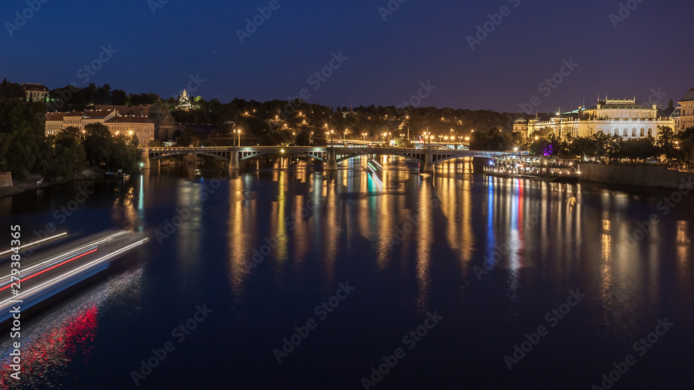 Vltava river and cityscape of Prague in the evening. Czech Republic.