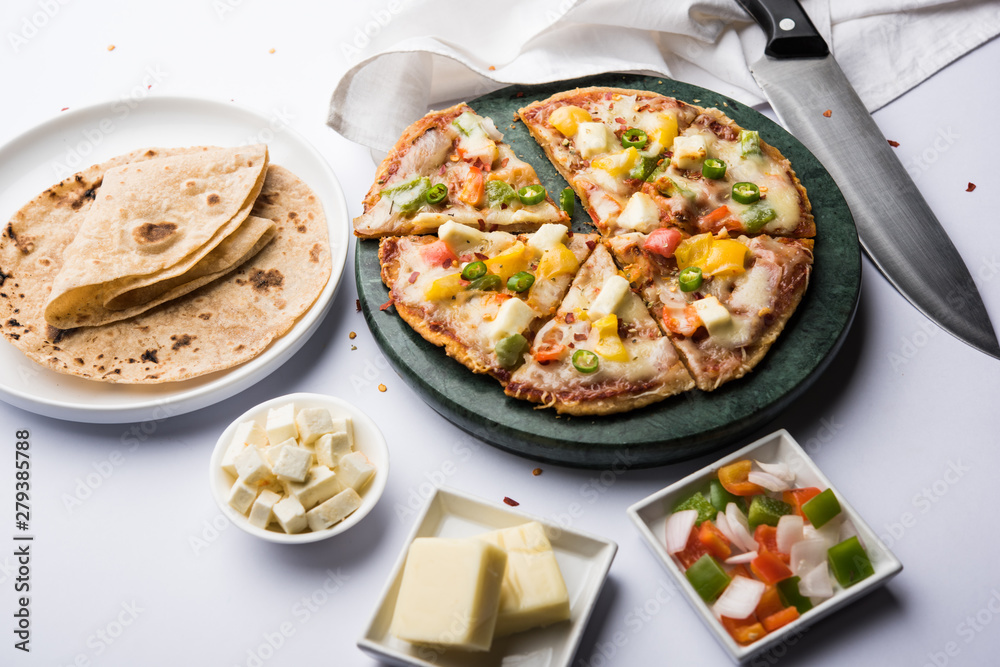 Chapati Pizza made using leftover Roti / Paratha with Cheese, vegetables, paneer and Sausage Chapati Pizza made using leftover Roti / Paratha with Cheese, vegetables, paneer and Sausage