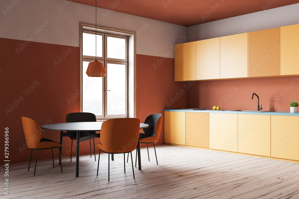 © ImageFlow - Orange kitchen corner, yellow counters and table © ImageFlow - Orange kitchen corner, yellow counters and table