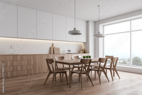 Panoramic white kitchen corner with table