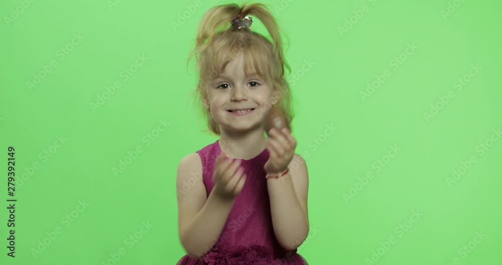 Girl in purple dress with chocolate egg. Happy four years old child. Chroma Key Girl in purple dress with chocolate egg. Happy four years old child. Chroma Key