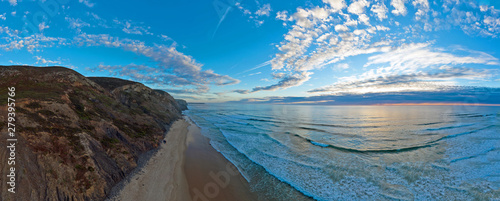 Panoramic aerial from praia vale figueiras in Portugal at sunset photo