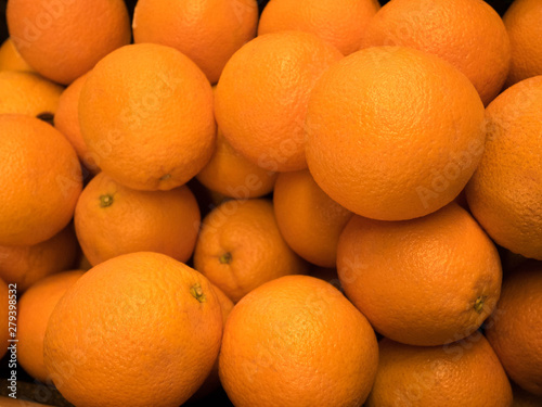 Bunch of fresh mandarin oranges on market place