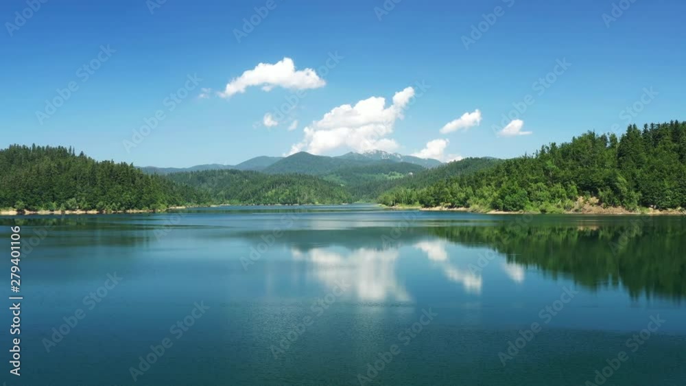 Panoramic view of beautiful Lokvarsko lake, drone flying over blue mountain lake in nature landscape in Gorski kotar, Croatia Panoramic view of beautiful Lokvarsko lake, drone flying over blue mountain lake in nature landscape in Gorski kotar, Croatia