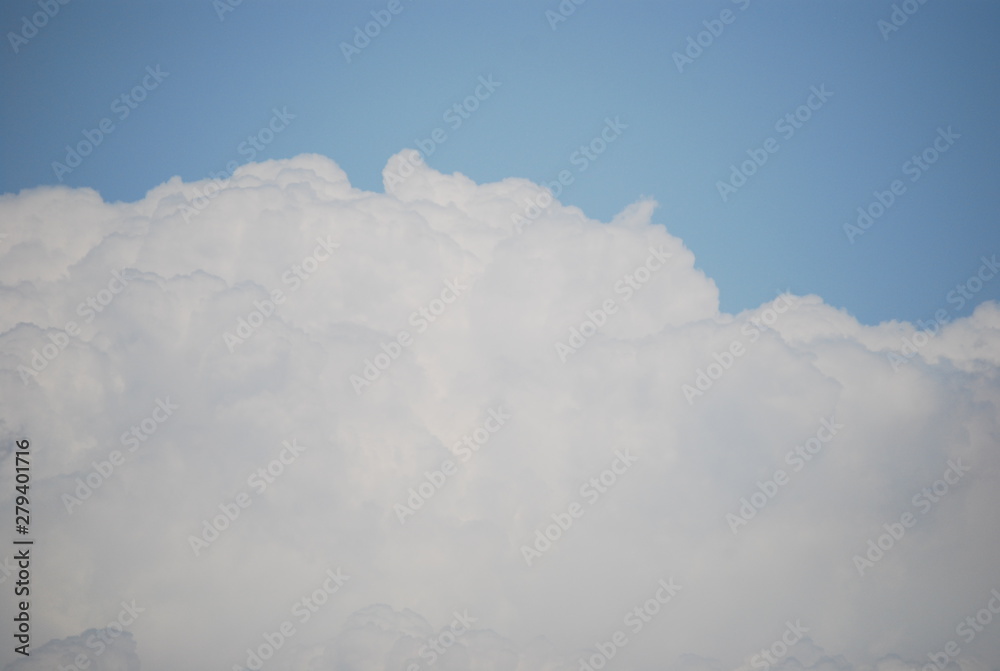 Fototapeta premium Light Blue Sky and Puffy White Cloud