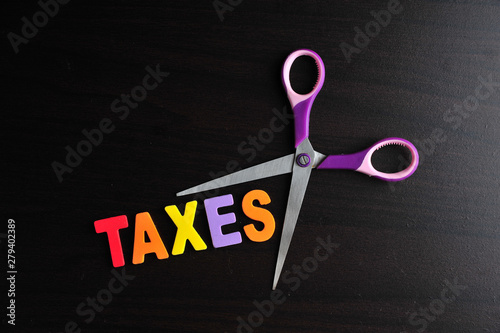 scissors and the alphabet TAXES