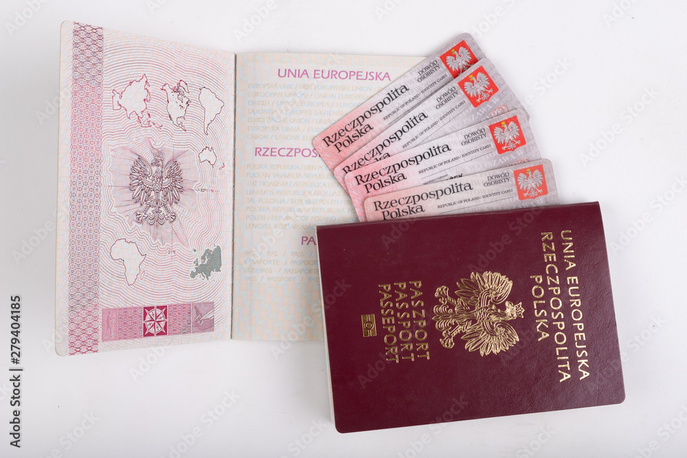Polish passport and ID card on a white table. Personal documents from a European country. Polish passport and ID card on a white table. Personal documents from a European country.