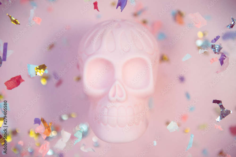 Halloween human pink skull on pastel background with free space for text.