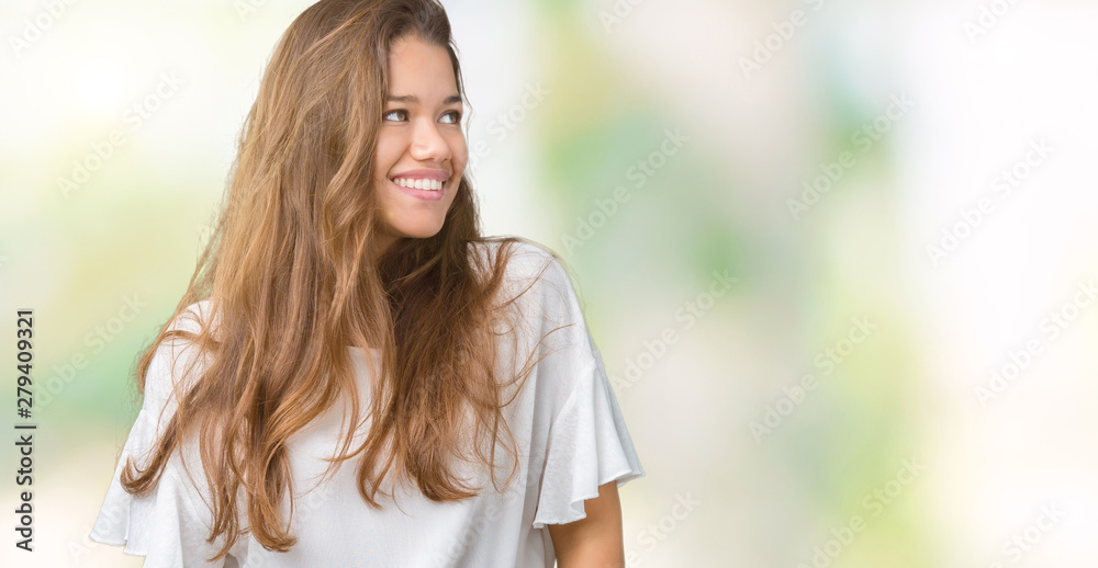 Young beautiful brunette business woman over isolated background looking away to side with smile on face, natural expression. Laughing confident. Young beautiful brunette business woman over isolated background looking away to side with smile on face, natural expression. Laughing confident.