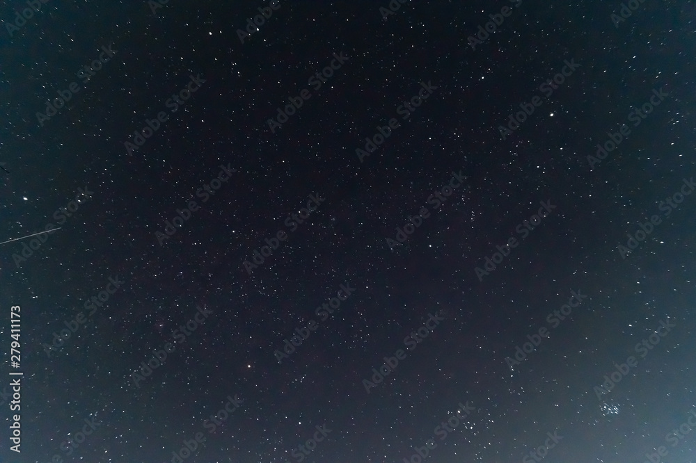  Underexposed night sky low light photo. A lot of stars and constellations on dark sky. Stock photo of deep sky.