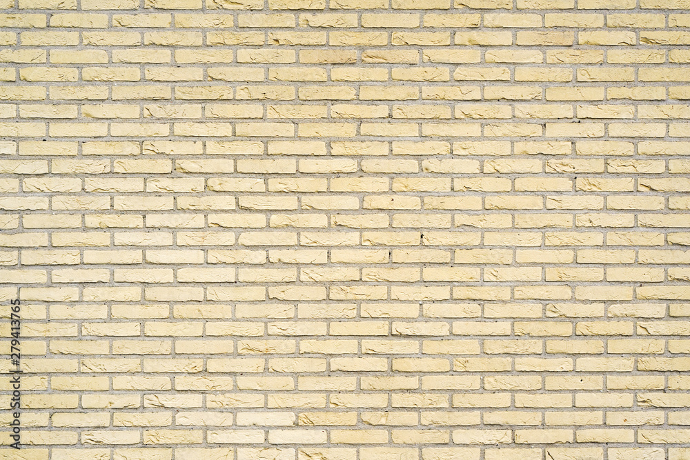 Yellow Brick wall background or texture. Old yellow brick wall texture