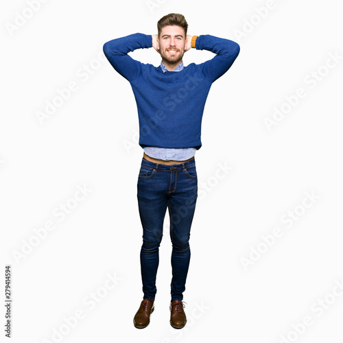 Young handsome bussines man Relaxing and stretching with arms and hands behind head and neck, smiling happy