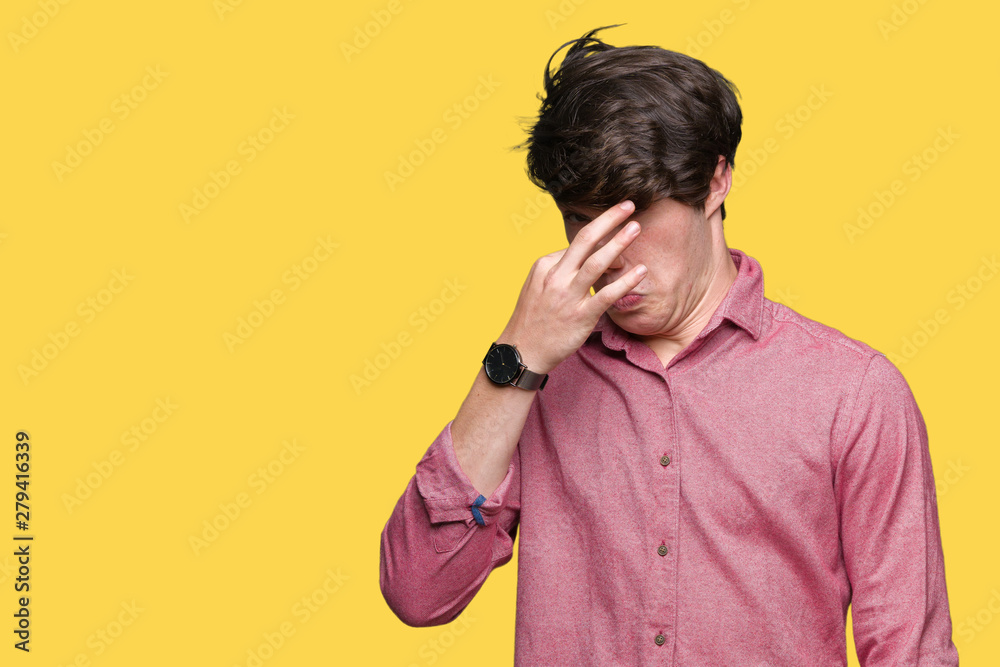 Young handsome business man over isolated background smelling something stinky and disgusting, intolerable smell, holding breath with fingers on nose. Bad smells concept. Young handsome business man over isolated background smelling something stinky and disgusting, intolerable smell, holding breath with fingers on nose. Bad smells concept.