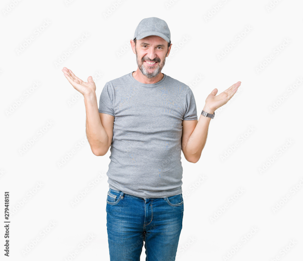 Handsome middle age hoary senior man wearing sport cap over isolated background Smiling showing both hands open palms, presenting and advertising comparison and balance Handsome middle age hoary senior man wearing sport cap over isolated background Smiling showing both hands open palms, presenting and advertising comparison and balance