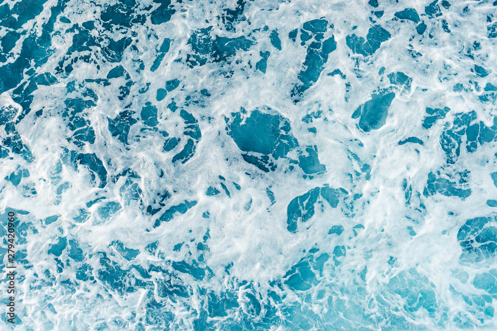 High angle view on the sea ocean wave foam water splash blue and white background