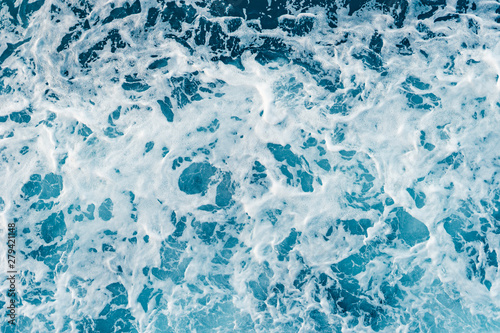 High angle view on the sea ocean wave foam water splash blue and white background