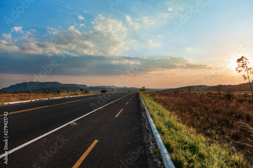 Bike lane on the side of a roadway at the sunset in Chapada dos Veadeiros, Brazil