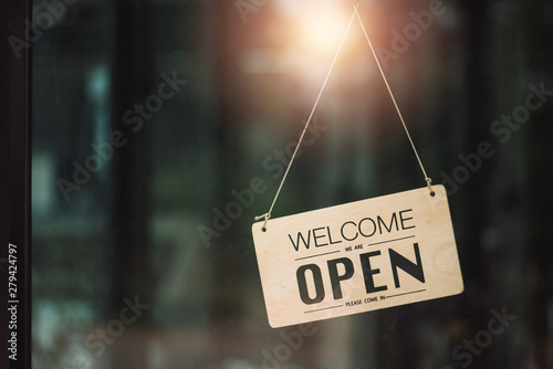 Obraz na plátně "Open" on cafe or restaurant hang on door at entrance.