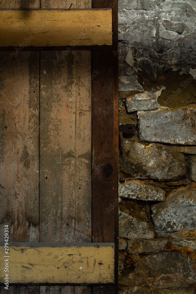 Wooden door and stone wall