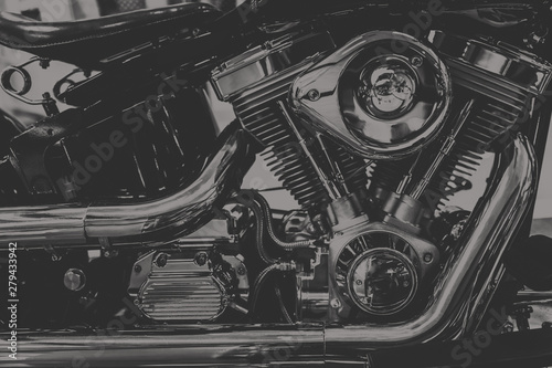 art photography in black and white vintage tone of chopper motorcycle engine., dim vintage tone photo
