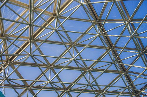 Blue sky behind the inorganic triangle ceiling