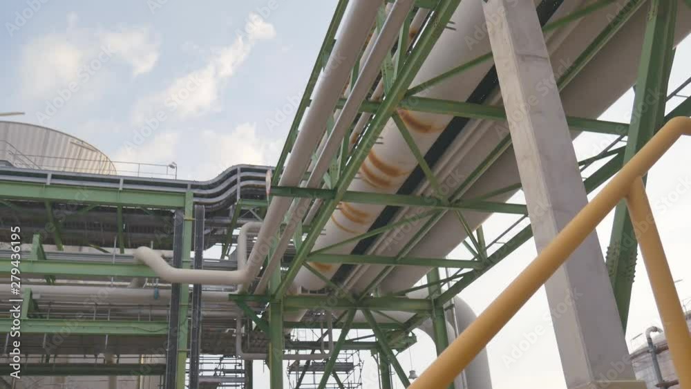 Engineering complex in Oil and Chemical refinery industrial plant , Structure and industrial equipment in production area of refinery plant , Panning video Engineering complex in Oil and Chemical refinery industrial plant , Structure and industrial equipment in production area of refinery plant , Panning video
