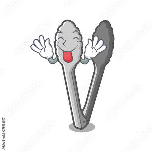 Tongue out character tongs on the kitchen table