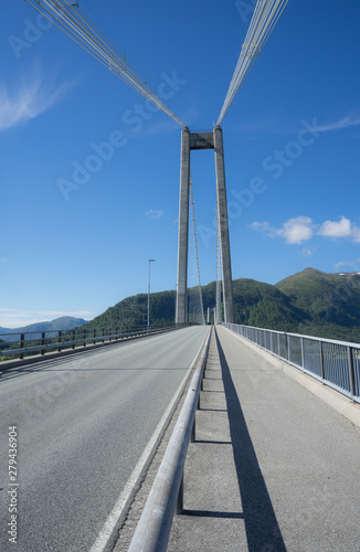 Detail of the Gjemnessund Bridge (also known as Gjemnessundbrua) - a suspension bridge that crosses the Gjemnessundet strait between the mainland and the island of Bergsoya. 