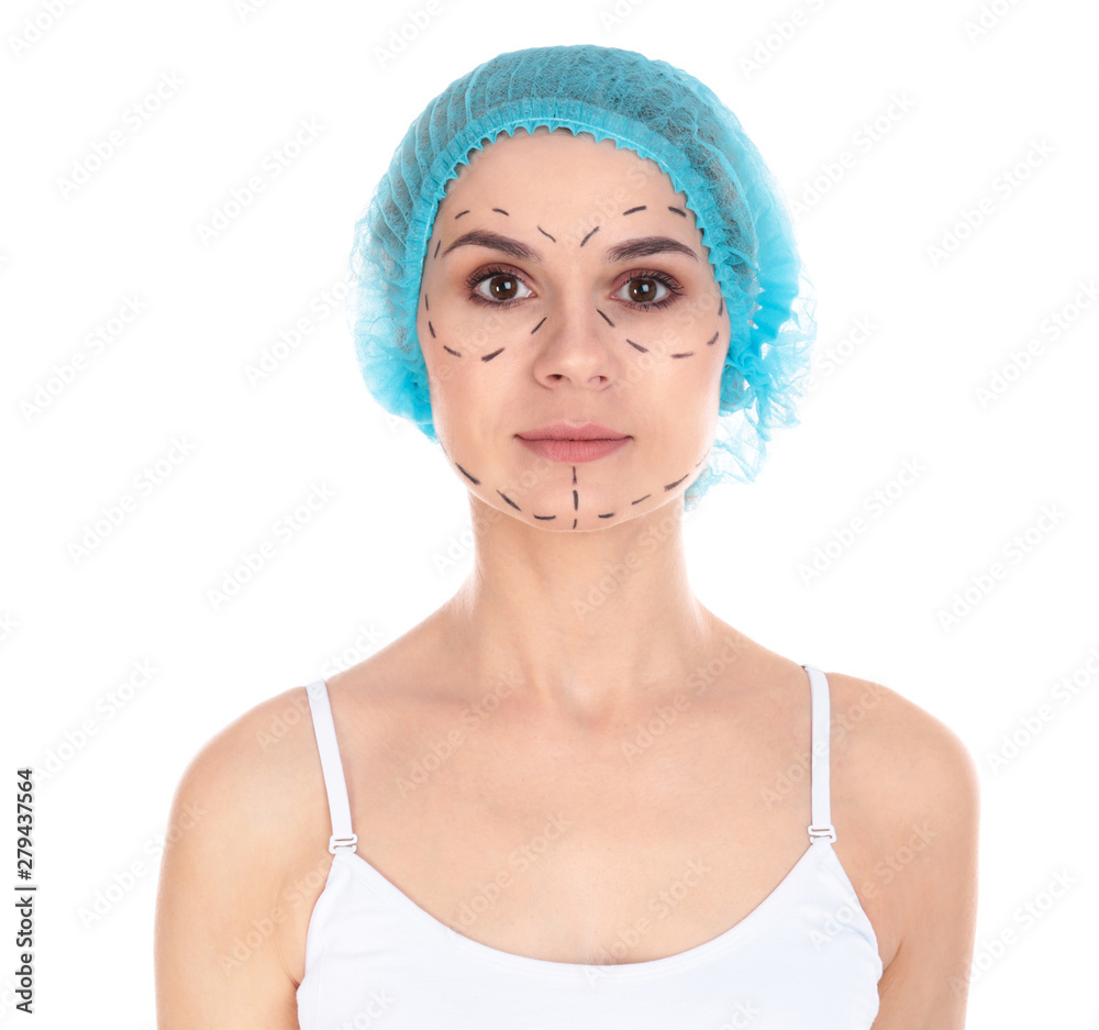Portrait of woman with marks on face for cosmetic surgery operation against white background
