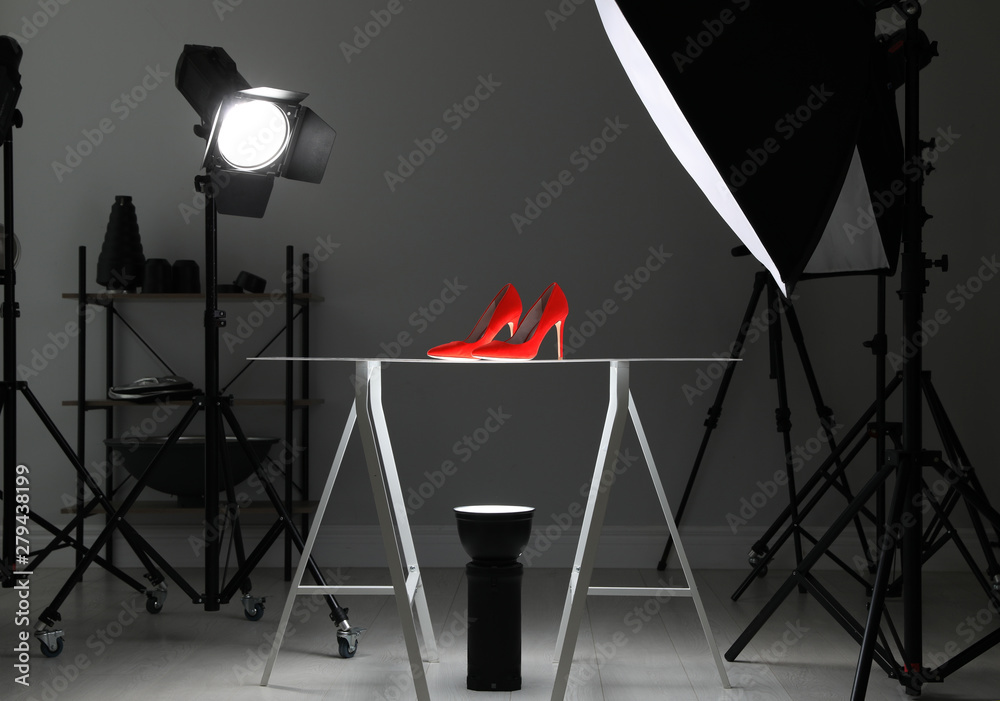 Professional photography equipment prepared for shooting stylish shoes in studio - obrazy, fototapety, plakaty 