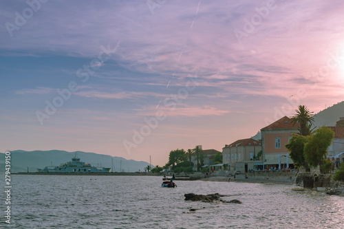 Embankement of the village of Orebic at sunset, Peljesac peninsula, Croatia photo
