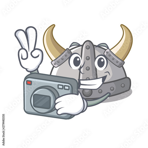 Photographer viking helmet toys on mascot table