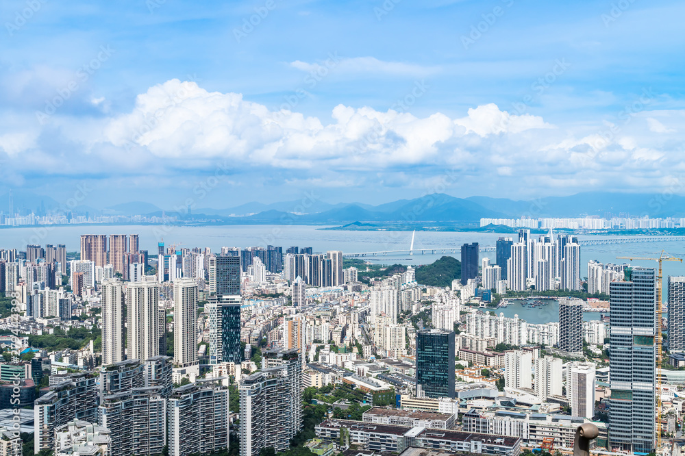 Fototapeta premium Shenzhen Nanshan District, Shenzhen, China residential real estate and Shenzhen Bay Bridge