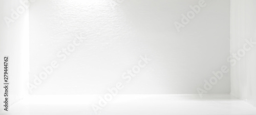 Light and shadow in the backdrop of an open white room