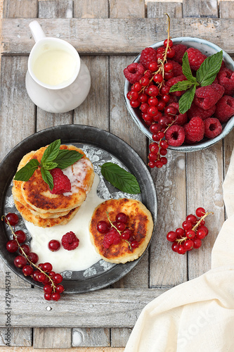 Cottage cheese pancakes Russian syrniki with  berries