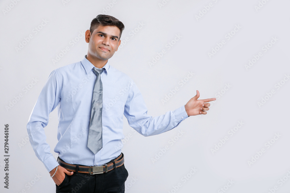 Young Indian man Showing direction with hand Young Indian man Showing direction with hand