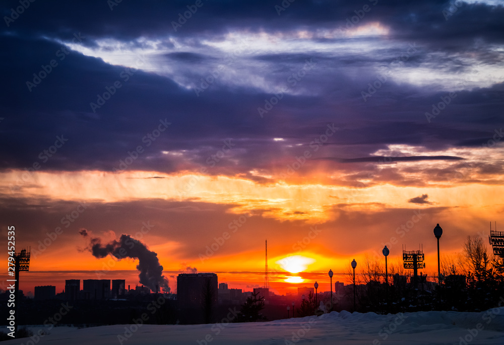 Beautiful scarlet sunsets in winter in Stroginsky backwater, Moscow