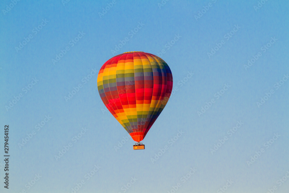 Fototapeta premium Hot air balloon flying over spectacular Cappadocia