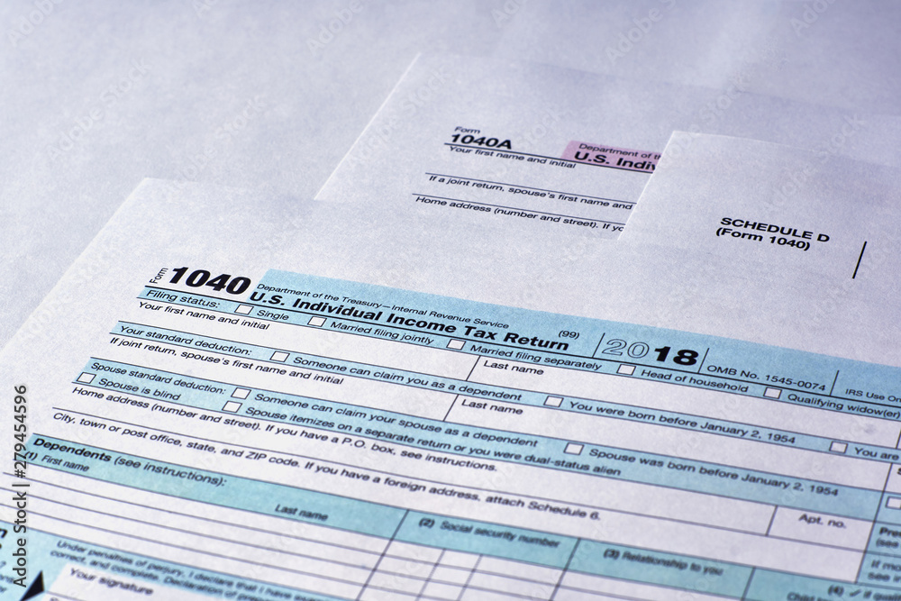Naklejka premium Tax Form 1040, Schedule D, 1040a on a white background