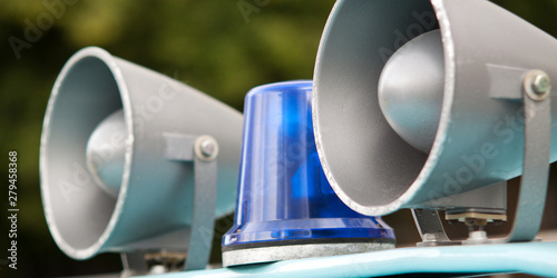 horns and beacon mounted on the machine