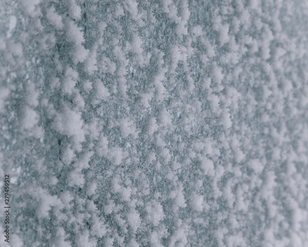 A snow and ice covered window A snow and ice covered window
