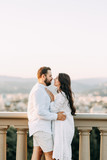  Happy couple at sunset in Rome. Wedding love story in Italy.