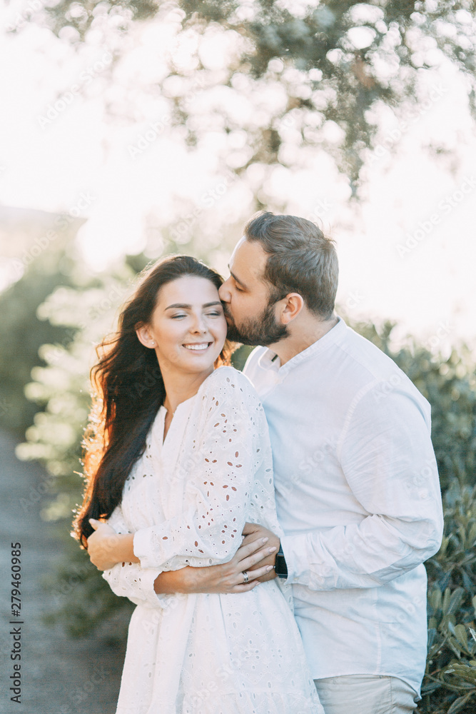 Happy couple at sunset in Rome. Wedding love story in Italy. Happy couple at sunset in Rome. Wedding love story in Italy.