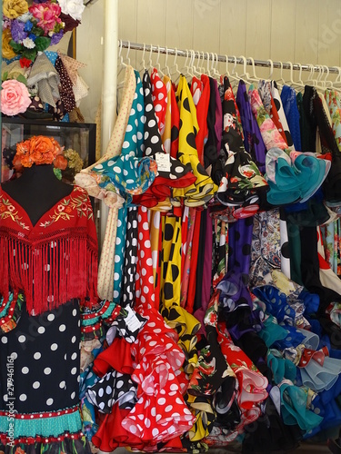 trajes de gitana o flamenca en perchero  photo