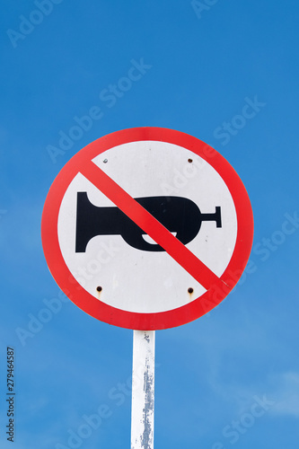 Do not use horn sign on blue sky background with clipping path included.