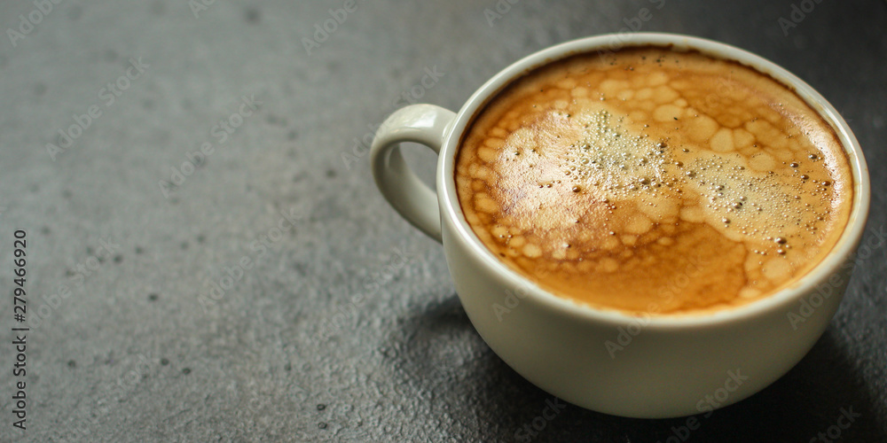 coffee freshly brewed in a white cup serving of beverage (coffee grain). food. top. copy space coffee freshly brewed in a white cup serving of beverage (coffee grain). food. top. copy space