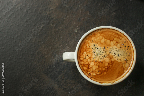 coffee freshly brewed in a white cup serving of beverage (coffee grain). food. top. copy space