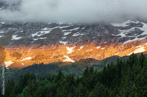 Mount Eiger north face in sunset photo