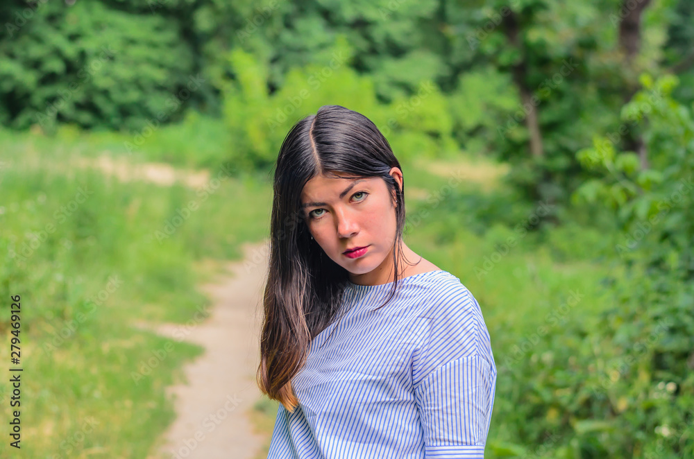 A photo of beautiful girl with black hair, green background A photo of beautiful girl with black hair, green background