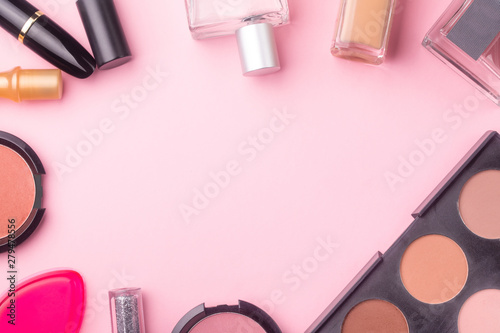 professional cosmetics on pink background. Flat lay, make-up background. cosmetic products mock up